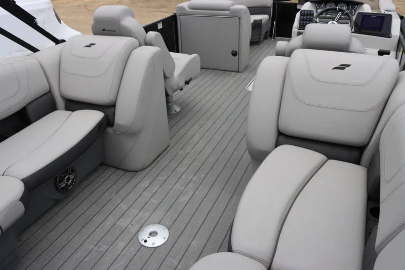 Slide: The Image of 2023 Starcraft SLS 3 boat interior with luxurious gray seating and modern design. - 17