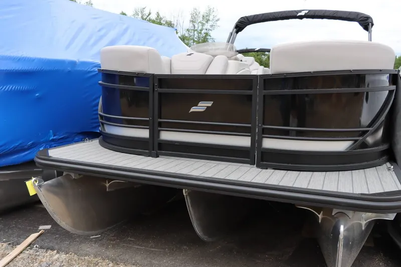 Slide: The Image of 2023 Starcraft SLS 3 pontoon boat rear view with seating and deck. - 5