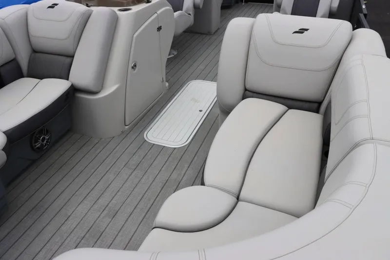 Slide: The Image of 2023 Starcraft SLS 3 boat interior with luxurious seating and gray flooring. - 9