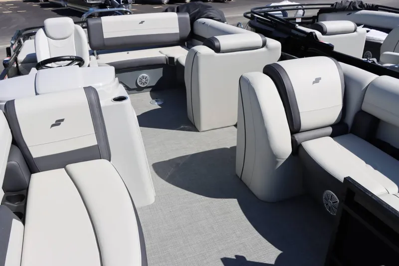 Slide: The Image of 2023 Starcraft EXS 3Q pontoon boat interior with luxurious seating and modern design. - 17