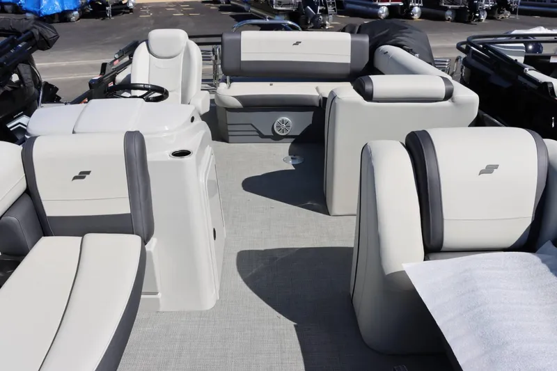 Slide: The Image of 2023 Starcraft EXS 3Q pontoon boat interior with luxurious seating and modern design. - 18