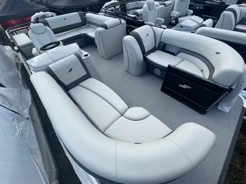 Slide: The Image of 2023 Starcraft EXS 3Q pontoon boat with luxurious white seating. - 8