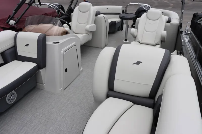Slide: The Image of Interior of 2024 Starcraft EXS 3 pontoon boat with luxurious seating and modern design. - 9
