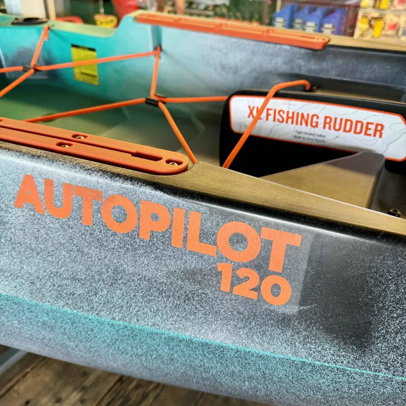 Slide: The Image of Close-up of 2023 Old Town Sportsman 120 Autopilot kayak with XL fishing rudder. - 4