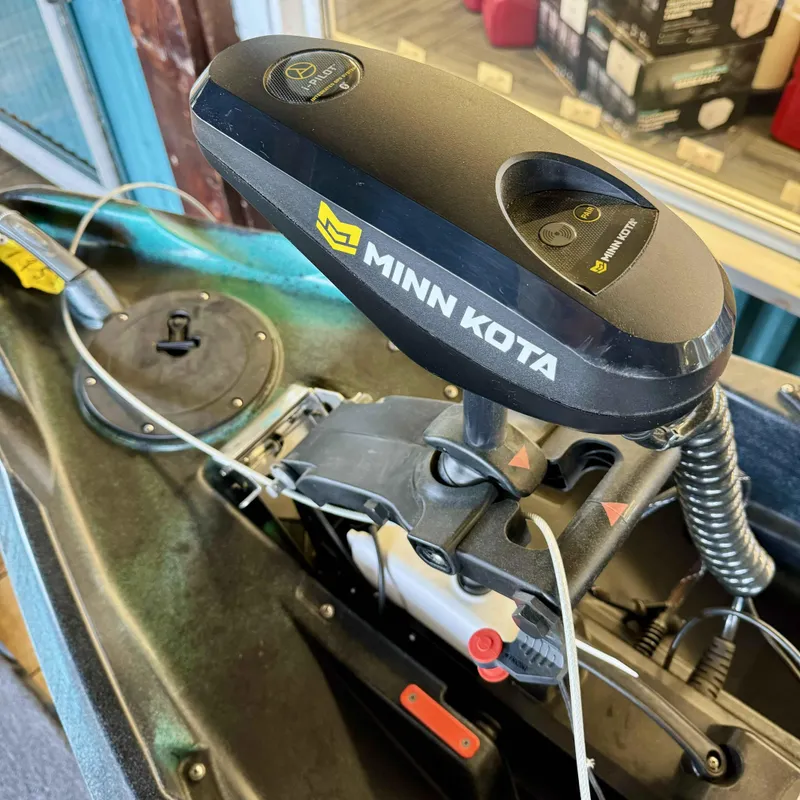 Slide: The Image of Close-up of Minn Kota motor on 2023 Old Town Sportsman 120 Autopilot kayak. - 6