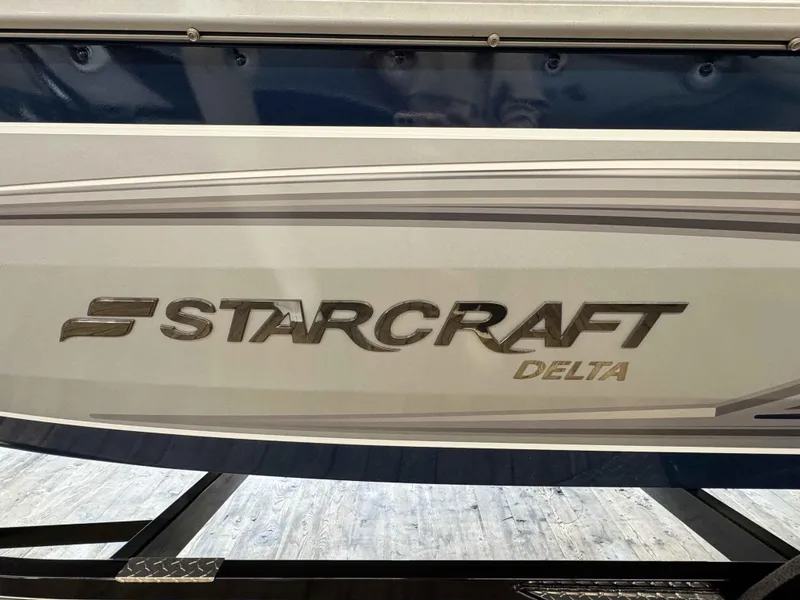 Slide: The Image of 2023 Starcraft Delta 188 FXS boat side view with logo. - 12