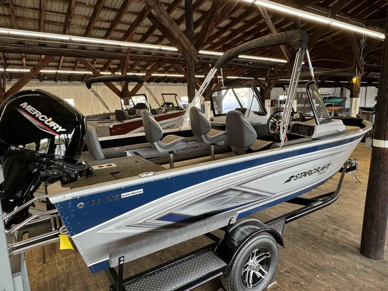 Slide: The Image of 2023 Starcraft Delta 188 FXS boat with Mercury engine in showroom. - 13