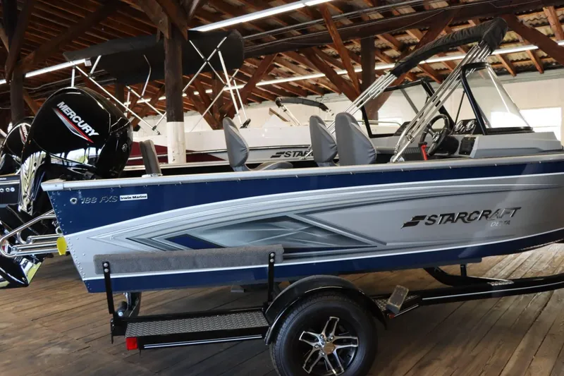 Slide: The Image of 2023 Starcraft Delta 188 FXS boat on trailer in showroom. - 3
