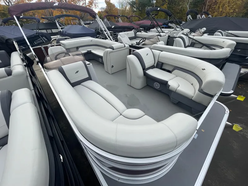 Slide: The Image of 2023 Starcraft EX 22C pontoon boat with spacious seating and modern design. - 12