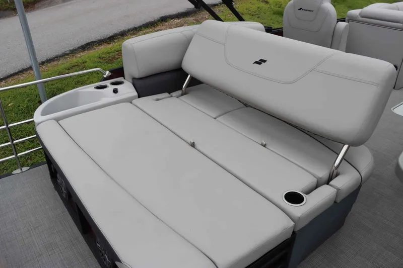Slide: The Image of 2023 Starcraft CX 23Q DH boat with luxurious seating and cup holders. - 15