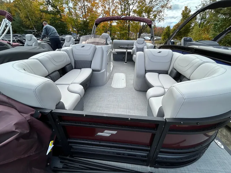 Slide: The Image of 2023 Starcraft CX 23Q DH pontoon boat with spacious seating and modern design. - 19