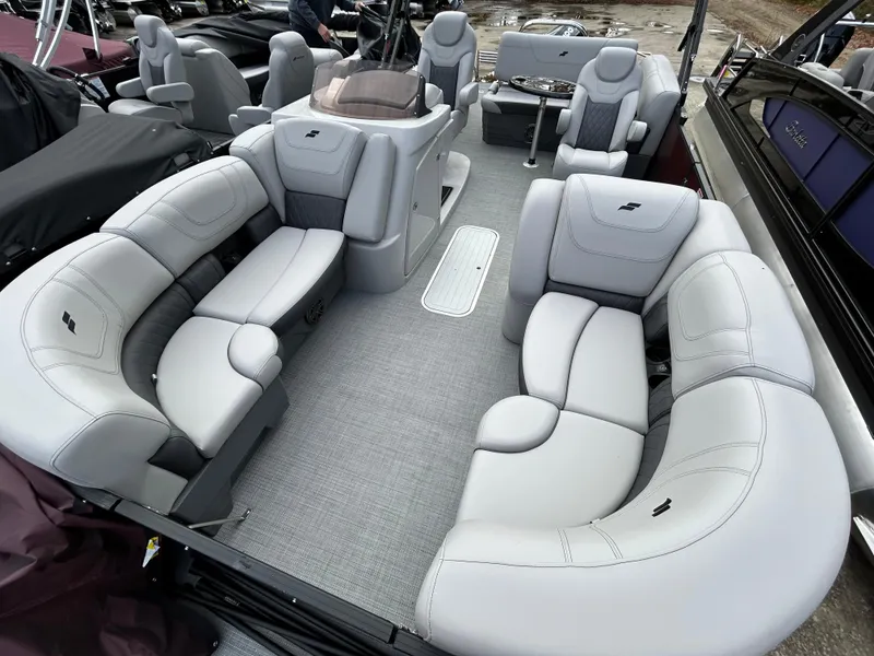 Slide: The Image of 2023 Starcraft CX 23Q DH pontoon boat with luxurious seating and modern design. - 24