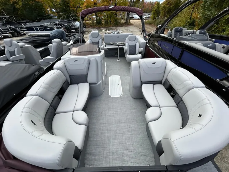 Slide: The Image of 2023 Starcraft CX 23Q DH pontoon boat with spacious seating and modern design. - 27