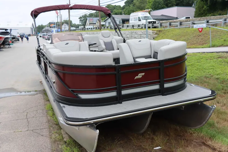 Slide: The Image of 2023 Starcraft CX 23Q DH pontoon boat with plush seating and sleek design. - 3