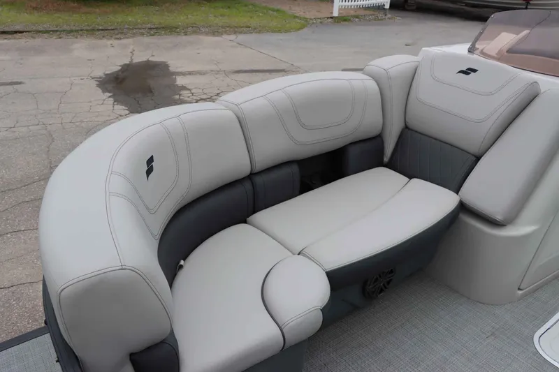Slide: The Image of 2023 Starcraft CX 23Q DH boat interior with plush seating and modern design. - 8