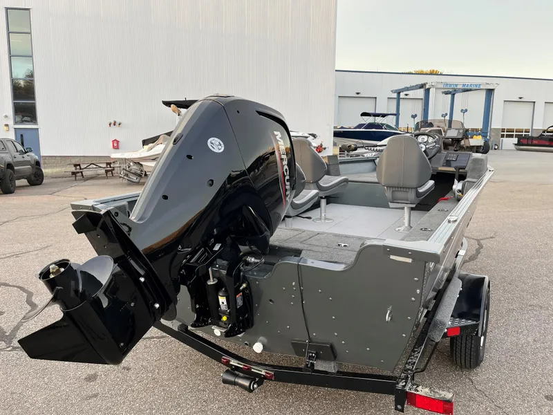 Slide: The Image of 2023 Starcraft Storm 176 SC fishing boat with Mercury outboard motor in a marina. - 6