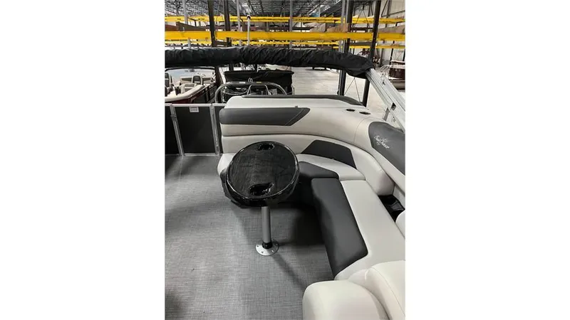 Slide: The Image of 2023 SunChaser Geneva 20CRS pontoon boat interior with seating and table. - 6