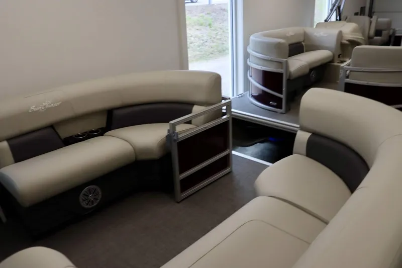 Slide: The Image of Interior of 2023 SunChaser VISTA 20LR pontoon boat with beige and gray seating. - 9