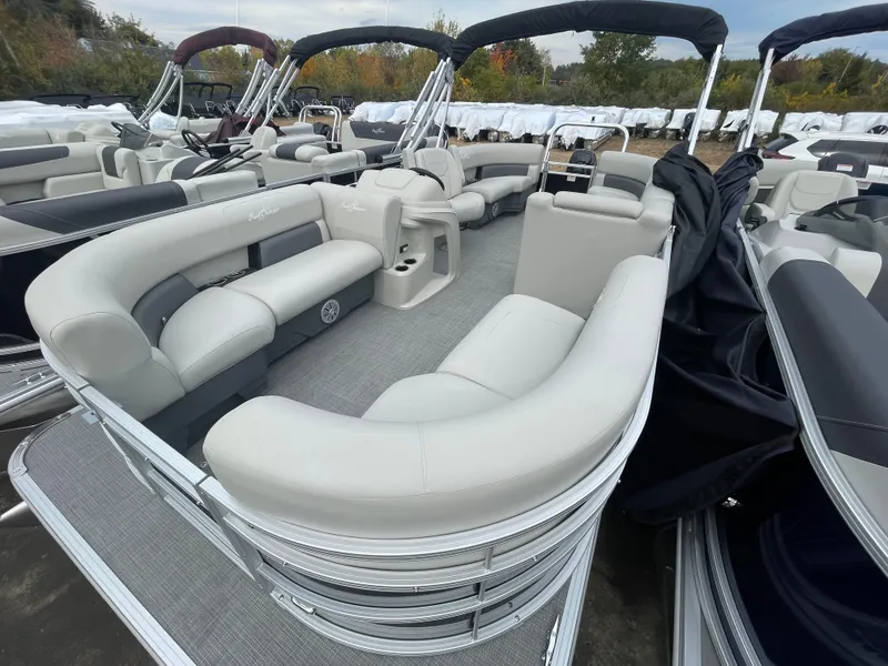 Slide: The Image of 2023 SunChaser VISTA 20LR pontoon boat with spacious seating and modern design. - 4