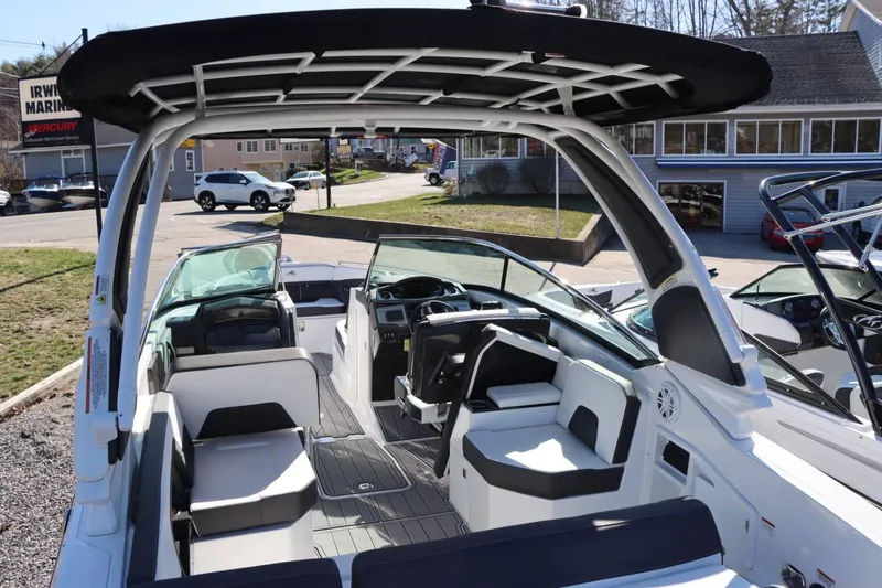 Slide: The Image of 2023 Monterey 298SS boat interior with seating and dashboard at Irwin Marine. - 10