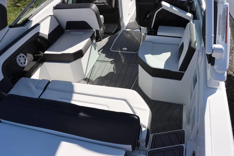 Slide: The Image of Interior of 2023 Monterey 298SS boat with modern seating and flooring. - 11