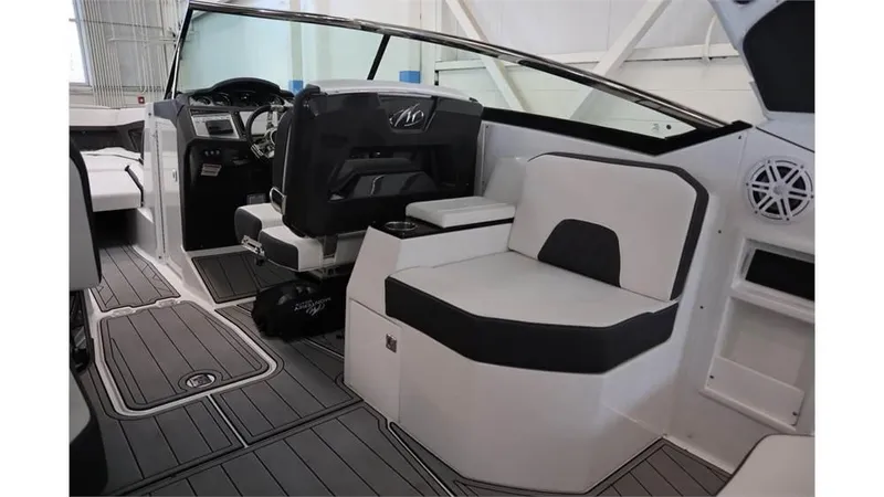 Slide: The Image of 2023 Monterey 298SS boat interior with modern seating and dashboard. - 16