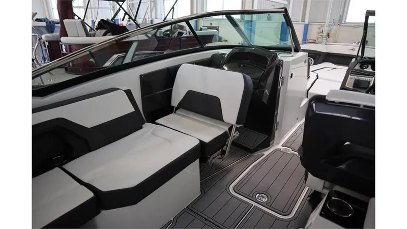 Slide: The Image of 2023 Monterey 298SS boat interior with modern seating and sleek design. - 17