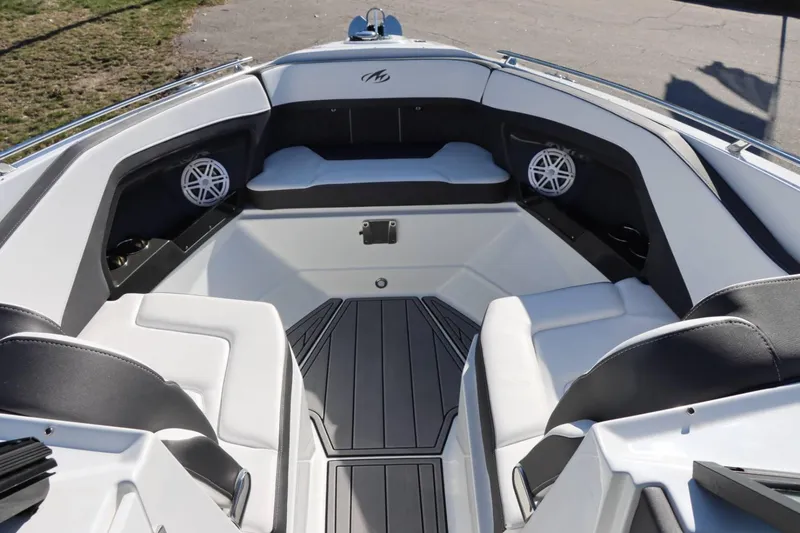 Slide: The Image of 2023 Monterey 298SS boat interior with white and black seating. - 21