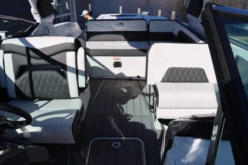 Slide: The Image of 2023 Monterey 298SS boat interior with luxurious seating and modern design. - 26