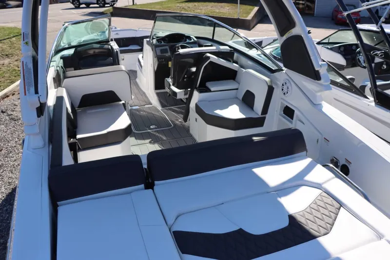 Slide: The Image of Interior of 2023 Monterey 298SS boat with modern seating and dashboard. - 9