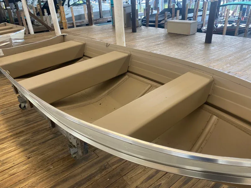 Slide: The Image of 2023 Starcraft 14 SEALITE TS aluminum boat on wooden dock. - 4