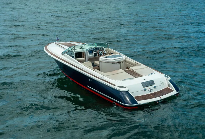 Slide: The Image of 2004 Chris-Craft Corsair 28 boat on open water. - 11