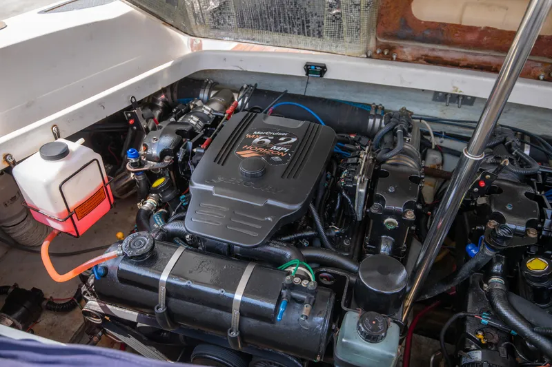 Slide: The Image of 2004 Chris-Craft Corsair 28 engine compartment with MerCruiser 496 MAG engine. - 35