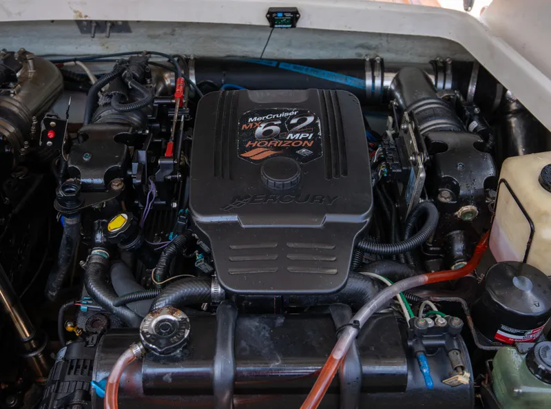 Slide: The Image of 2004 Chris-Craft Corsair 28 engine compartment with MerCruiser 6.2L MPI Horizon engine. - 38