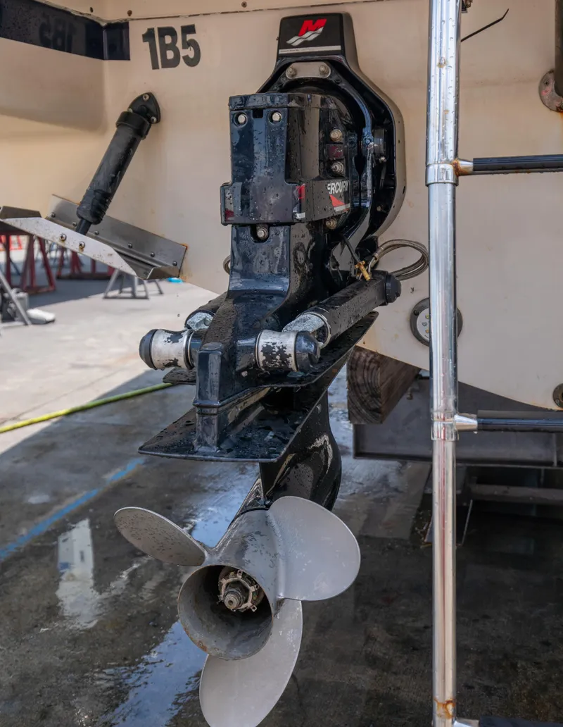 Slide: The Image of Close-up of a 2004 Chris-Craft Corsair 28 boat propeller and stern drive. - 40