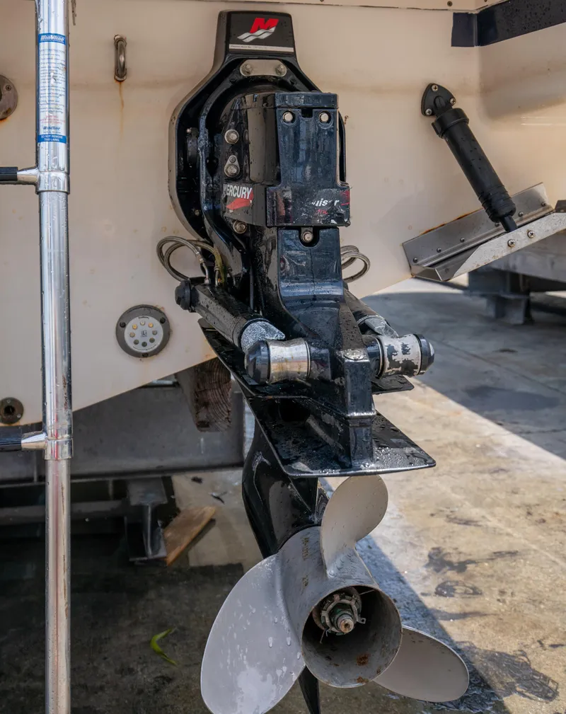 Slide: The Image of Close-up of a 2004 Chris-Craft Corsair 28 boat's propeller and stern drive. - 43