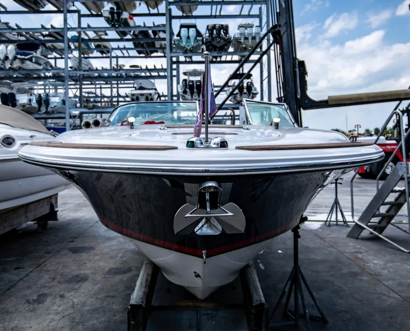 Slide: The Image of 2004 Chris-Craft Corsair 28 boat in storage facility. - 44