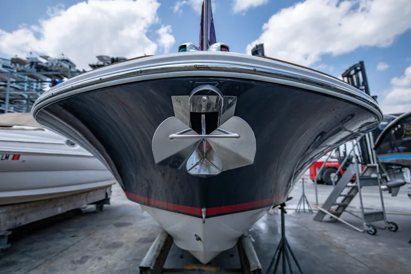 Slide: The Image of 2004 Chris-Craft Corsair 28 boat in dry dock, front view. - 46