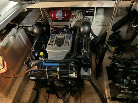 Slide: The Image of Engine compartment of a 2012 Sea Ray 280 Sundancer boat. - 11
