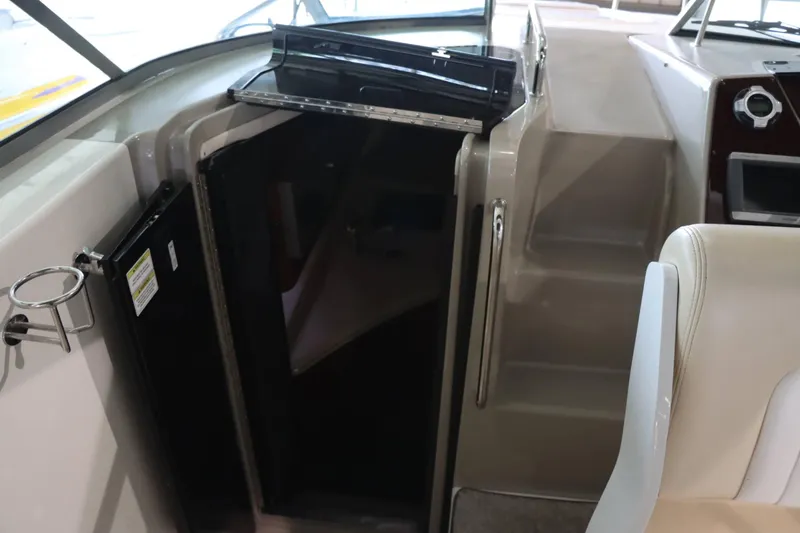 Slide: The Image of Interior view of 2012 Sea Ray 280 Sundancer cabin entrance and seating area. - 25