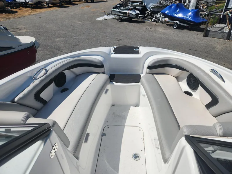 Slide: The Image of Interior of a 2010 Yamaha Boats 212SS, featuring spacious seating and clean design. - 6