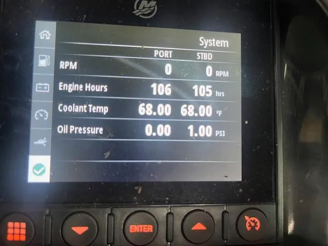 Slide: The Image of 2022 Monterey 298 Super Sport engine display showing RPM, engine hours, coolant temperature, and oil pressure. - 11