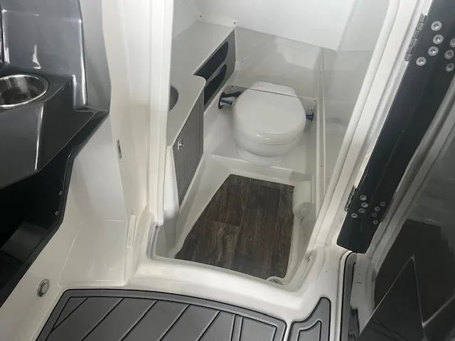 Slide: The Image of 2022 Monterey 298 Super Sport boat interior bathroom with modern fixtures. - 10