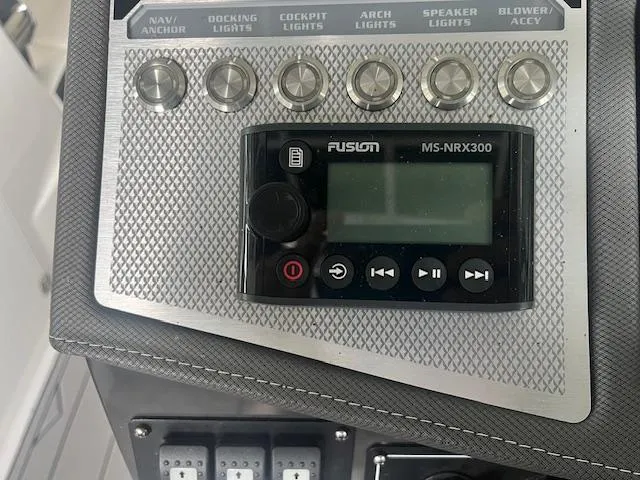 Slide: The Image of Control panel of a 2022 Monterey 298 Super Sport boat with Fusion MS-NRX300. - 13