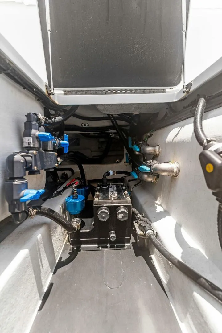 Slide: The Image of 2023 Barker Boatworks 40 HPC engine compartment with wiring and components. - 19