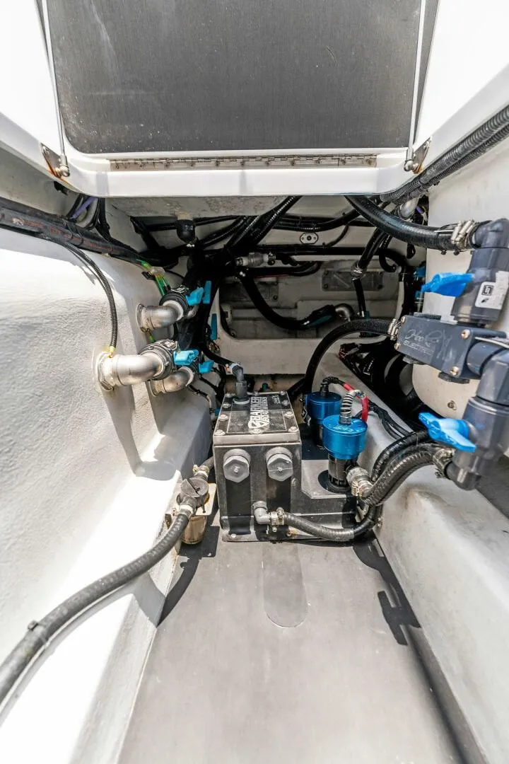 Slide: The Image of 2023 Barker Boatworks 40 HPC engine compartment with wiring and components. - 20