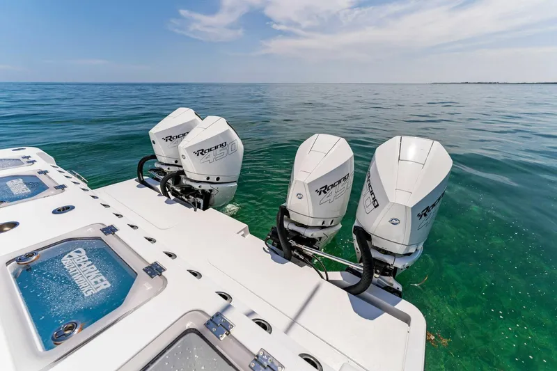 Slide: The Image of 2023 Barker Boatworks 40 HPC with triple outboard engines on the water. - 22