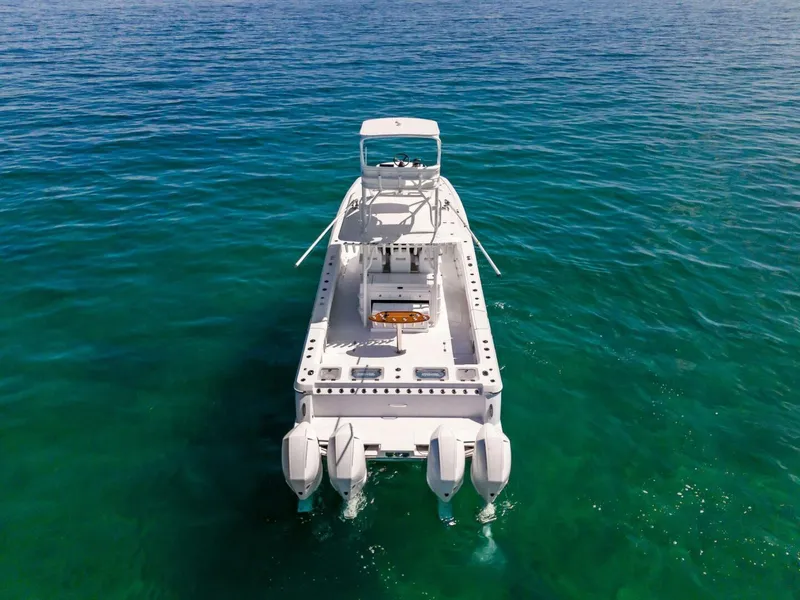 Slide: The Image of 2023 Barker Boatworks 40 HPC on open water, rear view. - 34