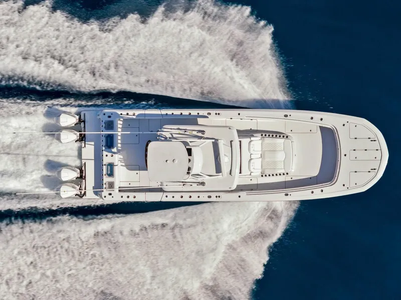 Slide: The Image of 2023 Barker Boatworks 40 HPC speeding on water, aerial view. - 35