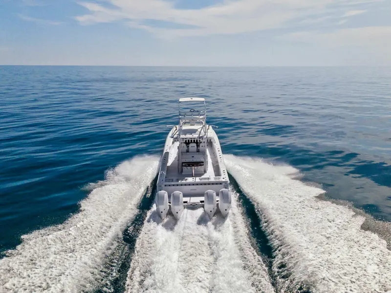 Slide: The Image of 2023 Barker Boatworks 40 HPC cruising on open water. - 37